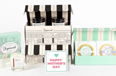 Sugarwish Mother's Day gift boxes with candle, gourmet goods, and spa items