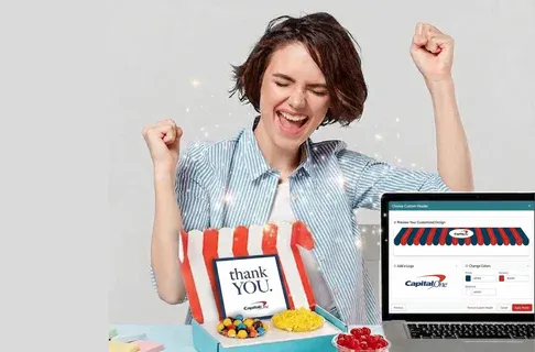 Custom branded Sugarwish corporate gift with company logo on gift box and branding interface on laptop