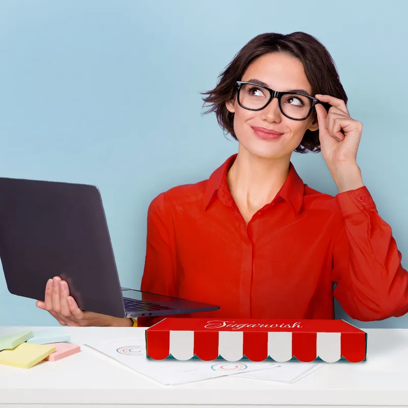 a boss lady happy after receiving a sugarwish gift.