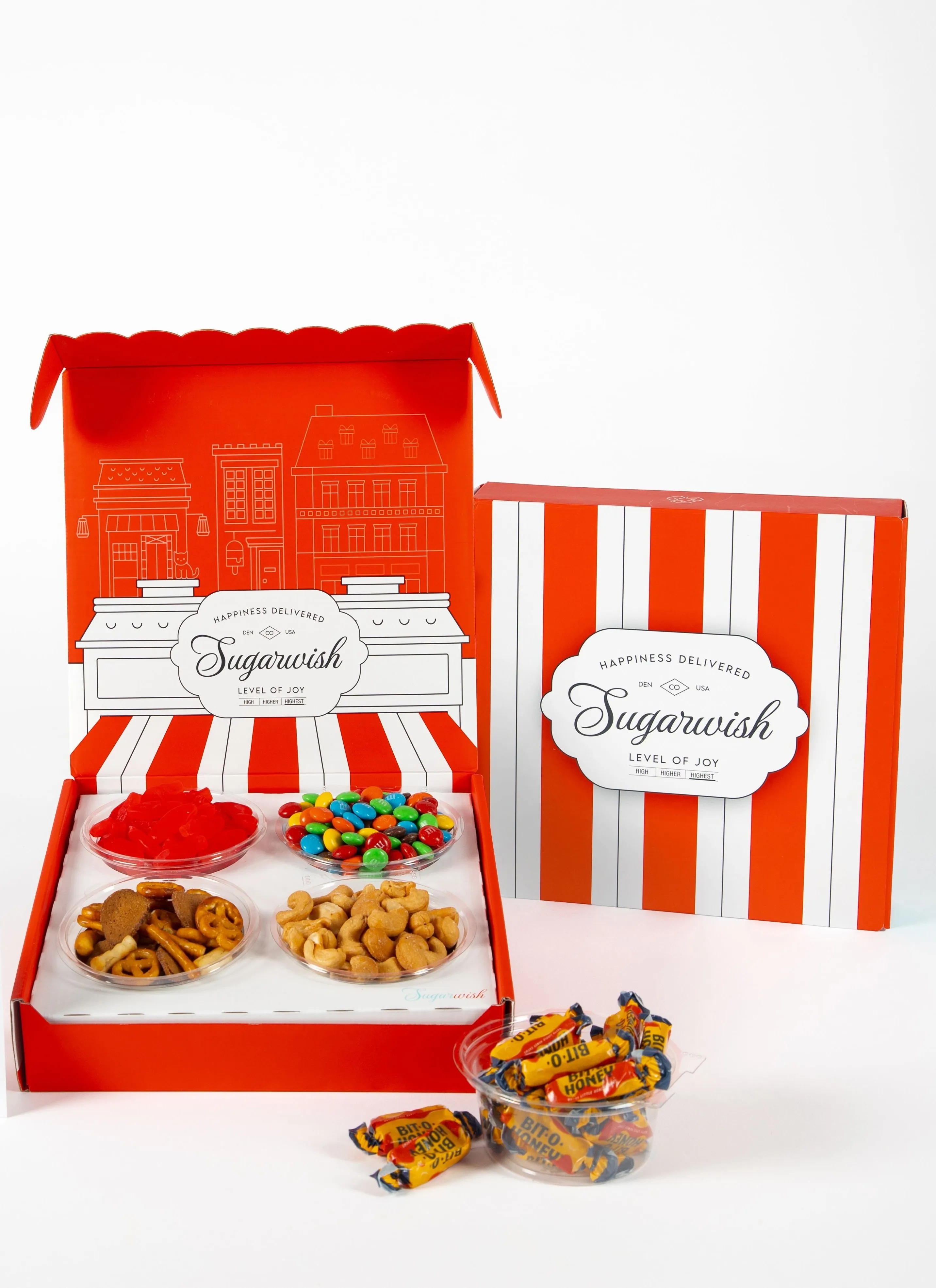 Open Sugarwish candy gift box showing colorful assorted candy treats