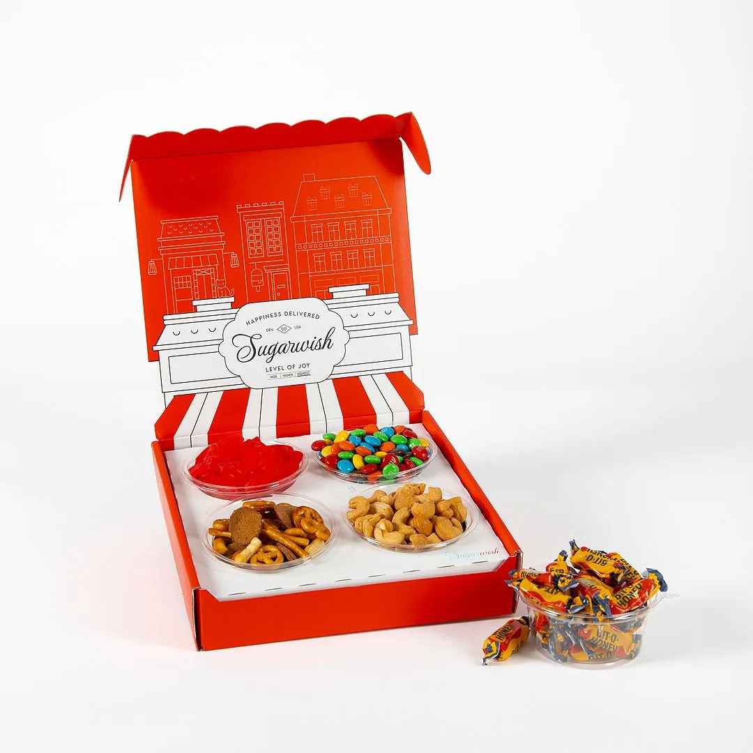 Open Sugarwish box filled with assorted candy and snack treats