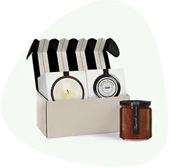 Gourmet goods and spa gift box with candle and honey