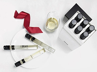 Person choosing a wine Sugarwish gift to send