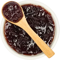 image of dark-colored jam with spoon spreader