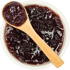 image of dark-colored jam with spoon spreader