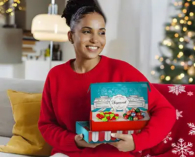 A girl buying and recieving sugarwish holiday Candy gifts.