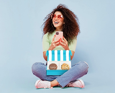 A girl buying and recieving sugarwish holiday gifts.