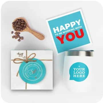 Product showing a spoon with whole bean coffee, a Sugarwish gift box, a mug stamped with the words 